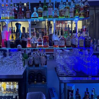 The illuminated full bar at Cloud Lounge